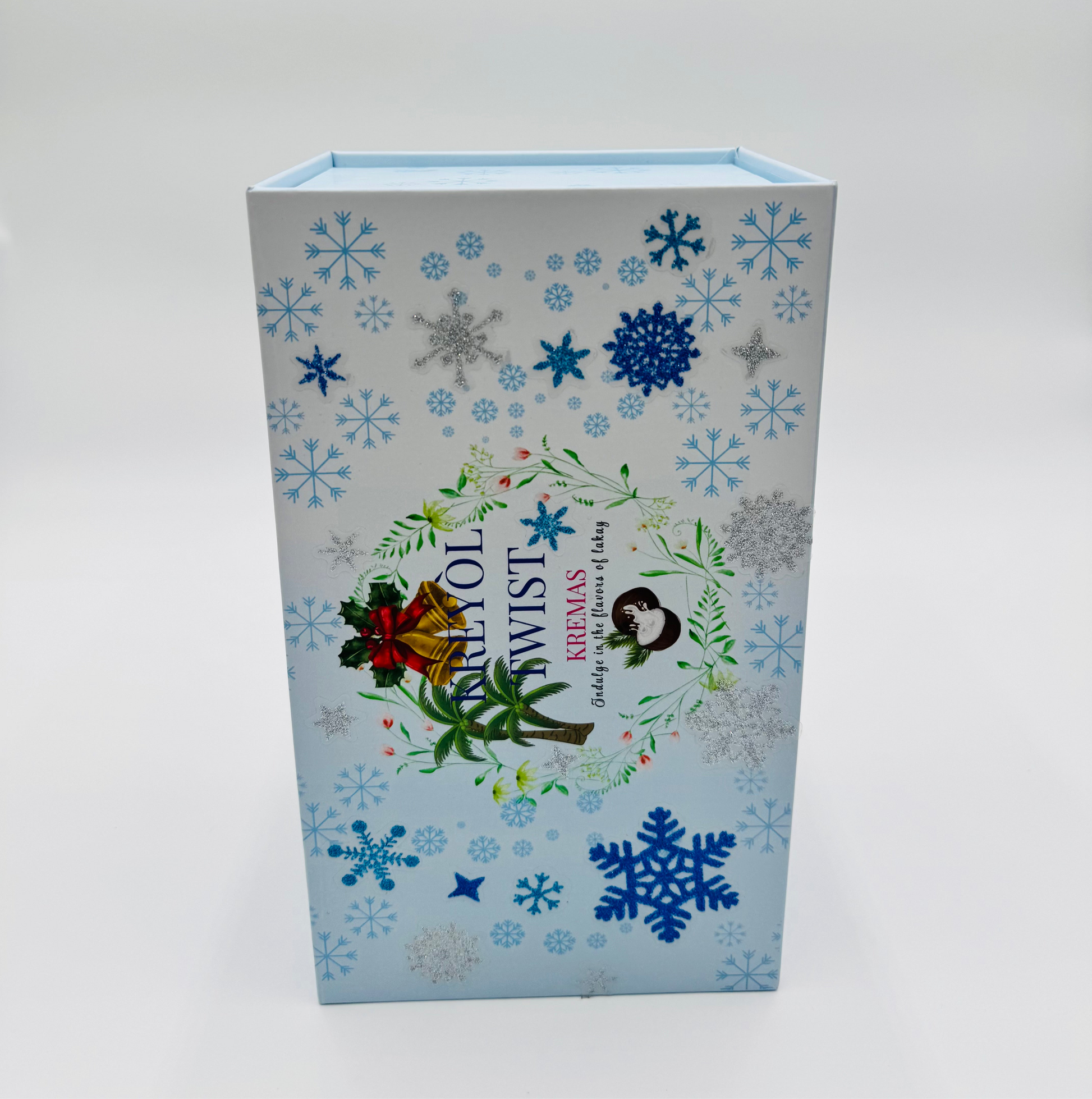 Decorative box with snowflake patterns and festive illustrations on a white background